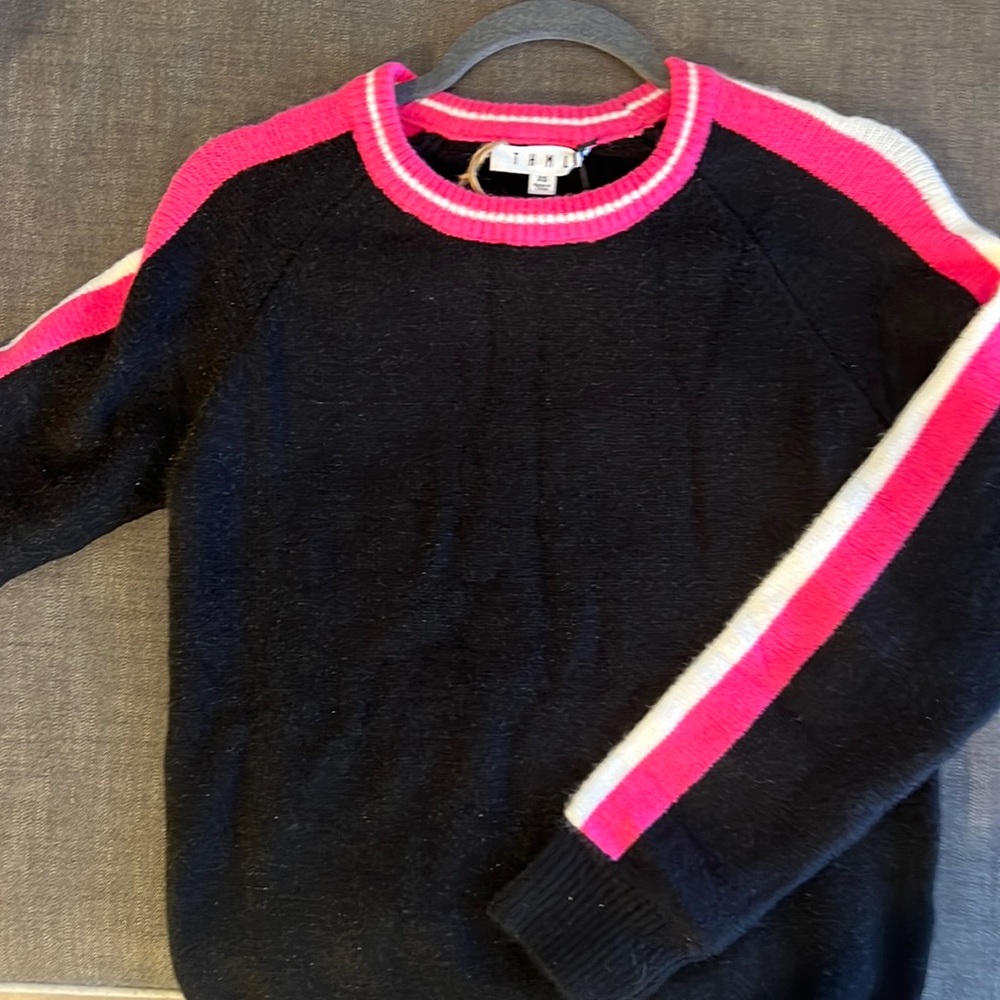 Brand new THML sweater with tags. Acrylic nylon and spandex